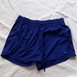 Blue Nike athletic shorts